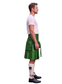 A man shown in profile wearing a green leather kilt, a white t-shirt, white knee-high socks, and black leather shoes, against a plain white background.