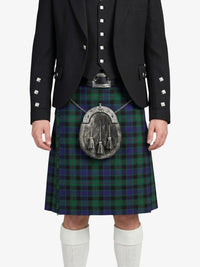 Person wearing a black jacket and green plaid kilt with a sporran on a white background