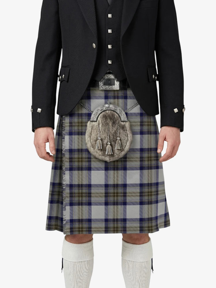 Person wearing a traditional Scottish kilt with a patterned sporran on a white background