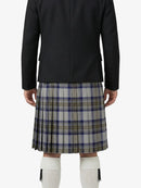 Person wearing a black jacket and plaid kilt on a white background