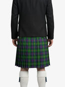 Person wearing a black jacket and green plaid kilt on a white background