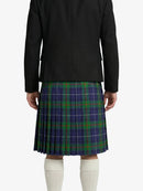 Person wearing a black jacket and plaid kilt on a white background