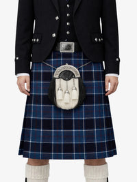 Person wearing a traditional Scottish kilt with a sporran on a white background