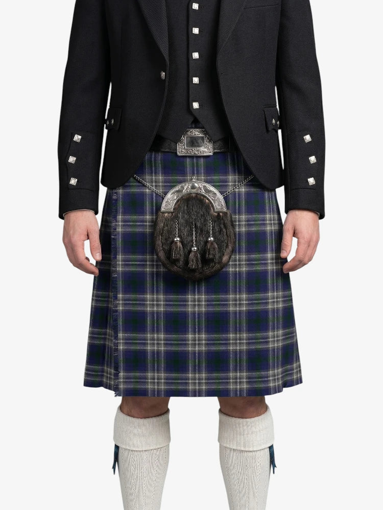 Person wearing a traditional Scottish kilt with a sporran on a white background