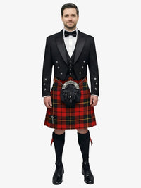 Man wearing a formal black prince charlie jacket with a wallace tartan kilt on a white background
