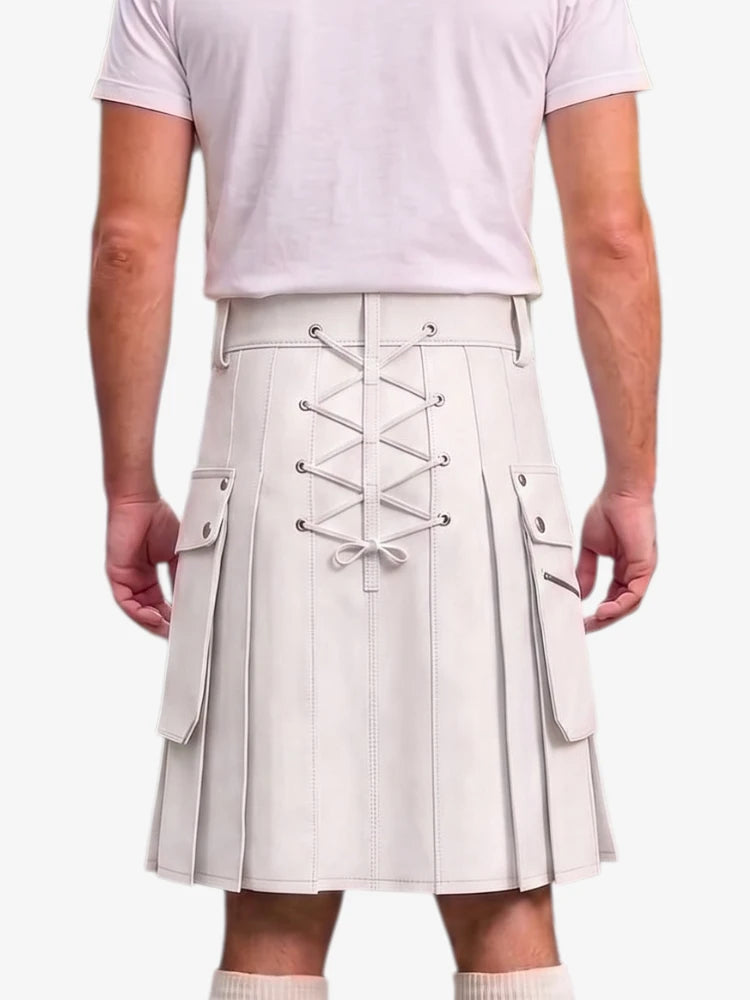 A person shown from the back wearing a pleated kilt with front lace-up detailing and side cargo pockets, paired with a light pink t-shirt and white socks against a plain light background.