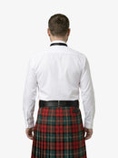 Man wearing a white shirt and red plaid kilt on a white background
