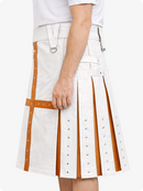 White skirt with brown accents worn by a person on a white background