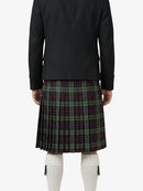 Person wearing a black jacket and plaid kilt on a white background