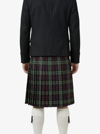 Person wearing a black jacket and plaid kilt on a white background