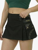 Person wearing a black skirt with gold buttons on a white background