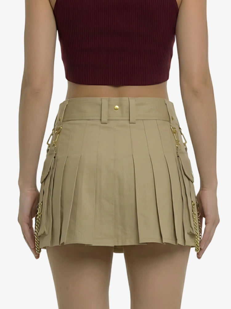 Beige pleated skirt worn by a person on a white background