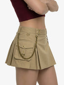 Beige skirt with gold chain detail worn by a person on a white background