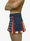 Person wearing a skirt with American flag design on a plain background