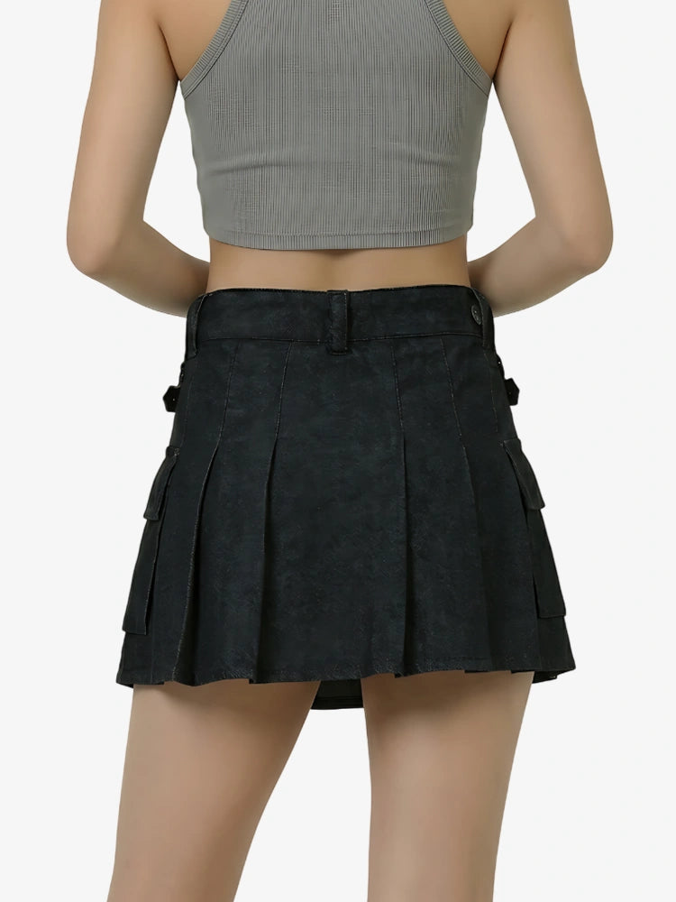 Black pleated skirt worn by a mannequin on a white background