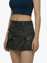 Black denim skirt with button details worn by a person on a white background