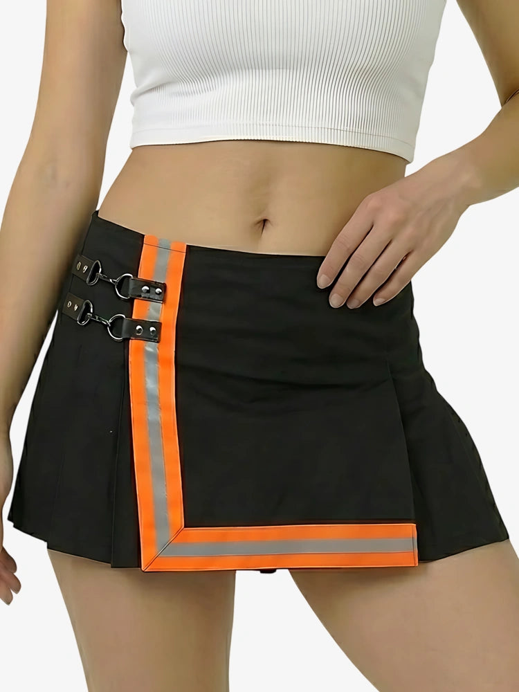 Black skirt with orange and reflective strip worn by a person on a white background