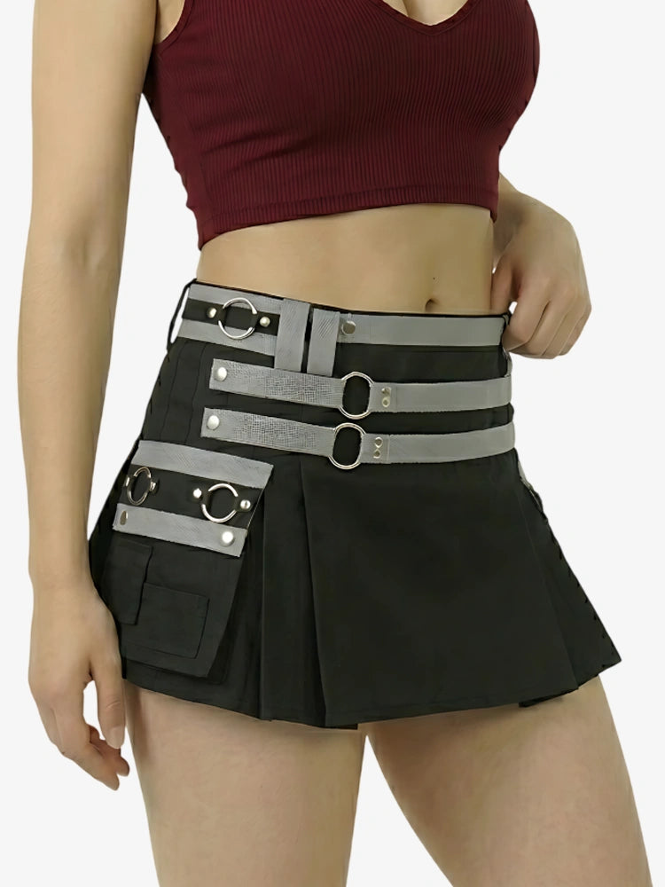 Black skirt with silver belt and decorative elements worn by a person on a white background