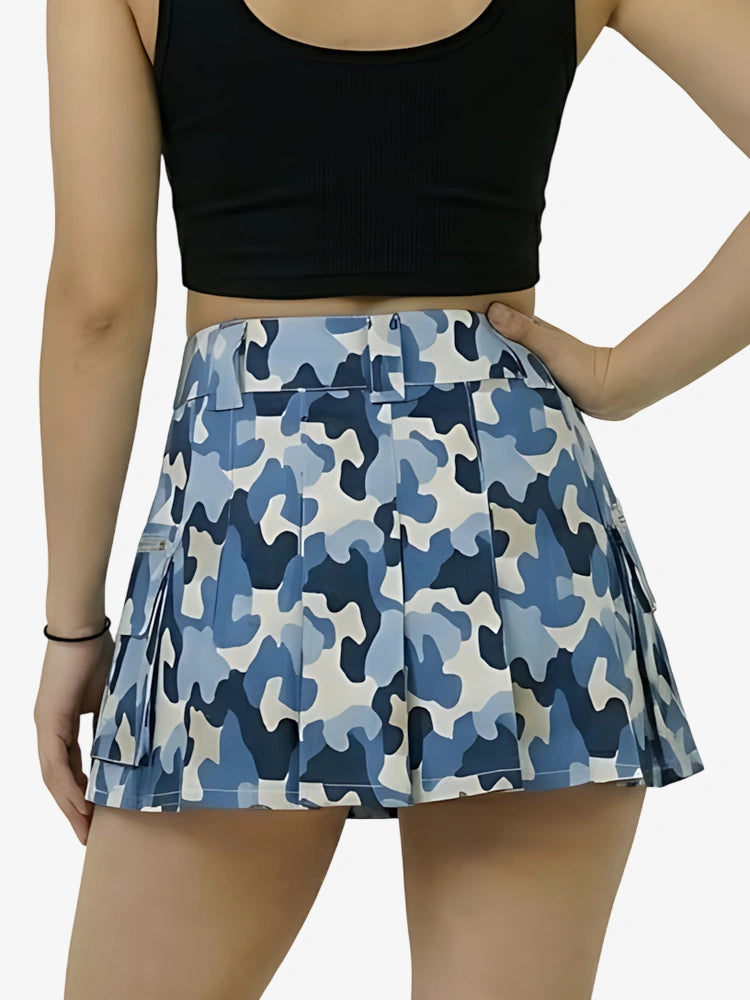 Blue camouflage skirt worn by a person on a white background