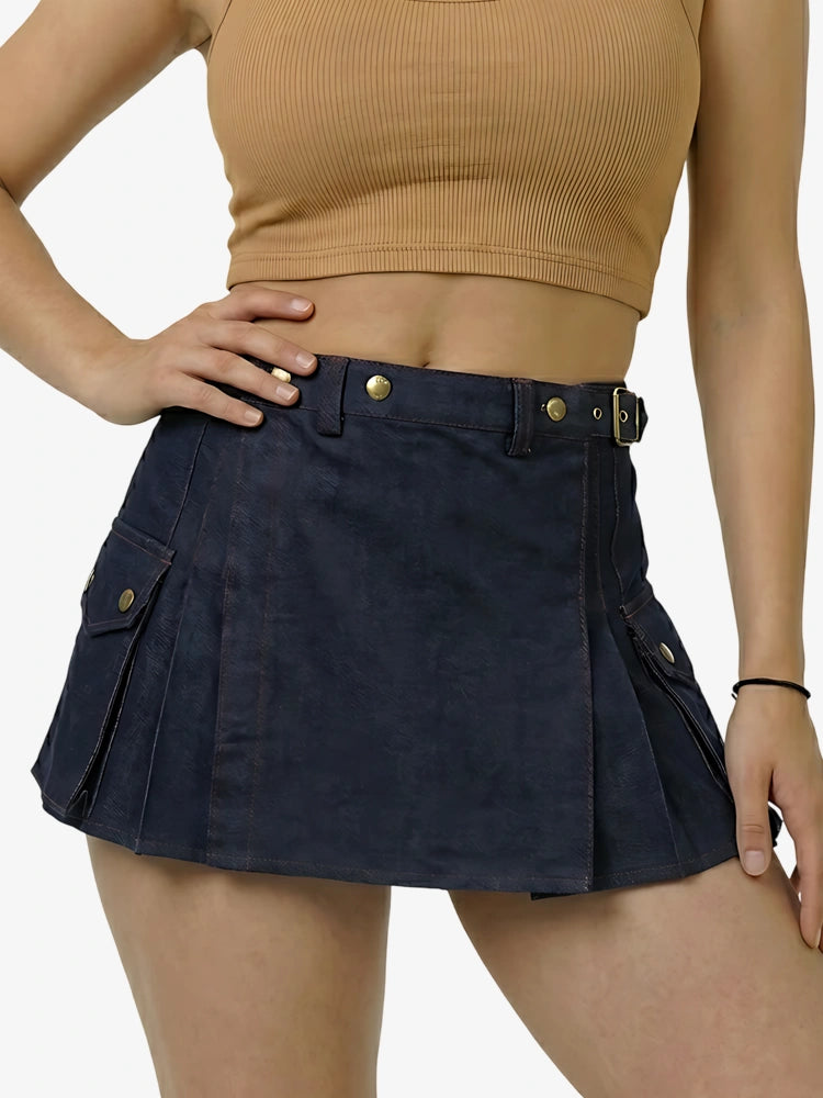 Person wearing a navy blue skirt with gold buttons on a white background