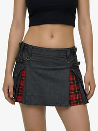 Black denim skirt with plaid accents worn by a person on a white background
