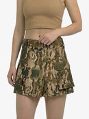 Camouflage skirt worn by a person on a white background