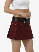 Maroon skirt with black belt and gold buttons on a white background