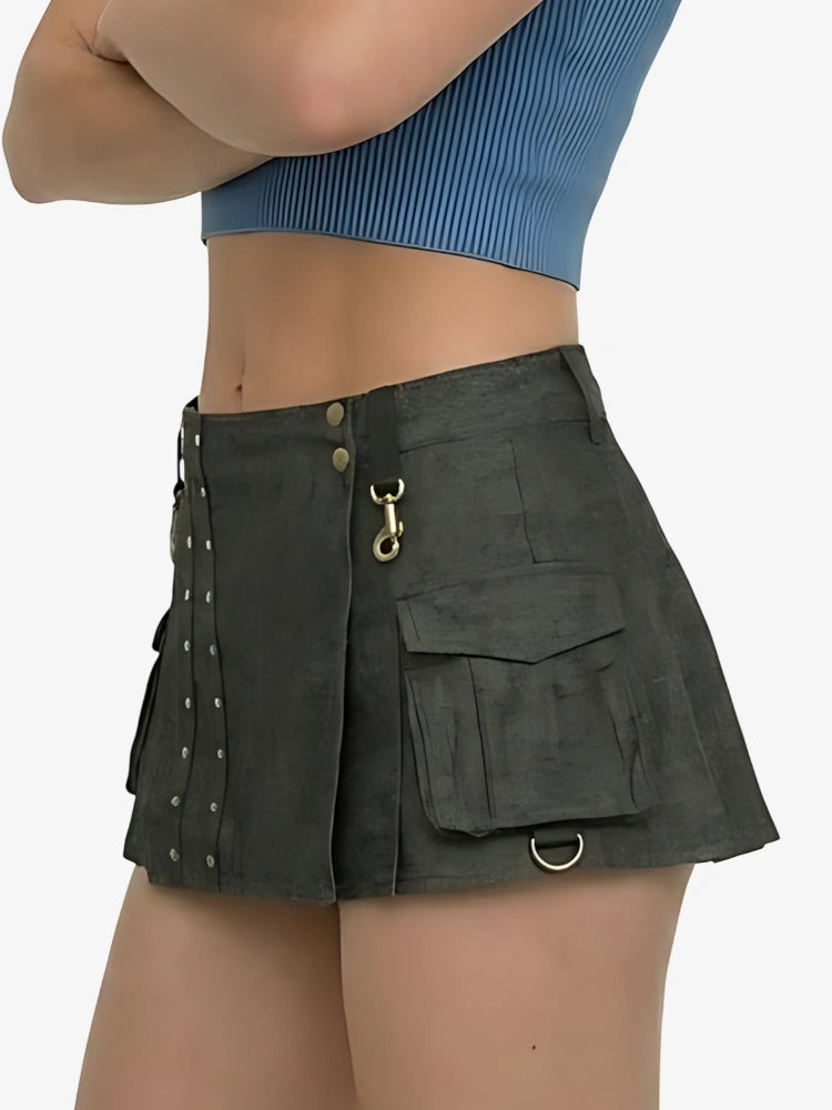 Person wearing a dark green skirt with multiple pockets on a white background