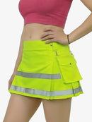 Person wearing a bright yellow safety skirt with reflective stripes on a white background