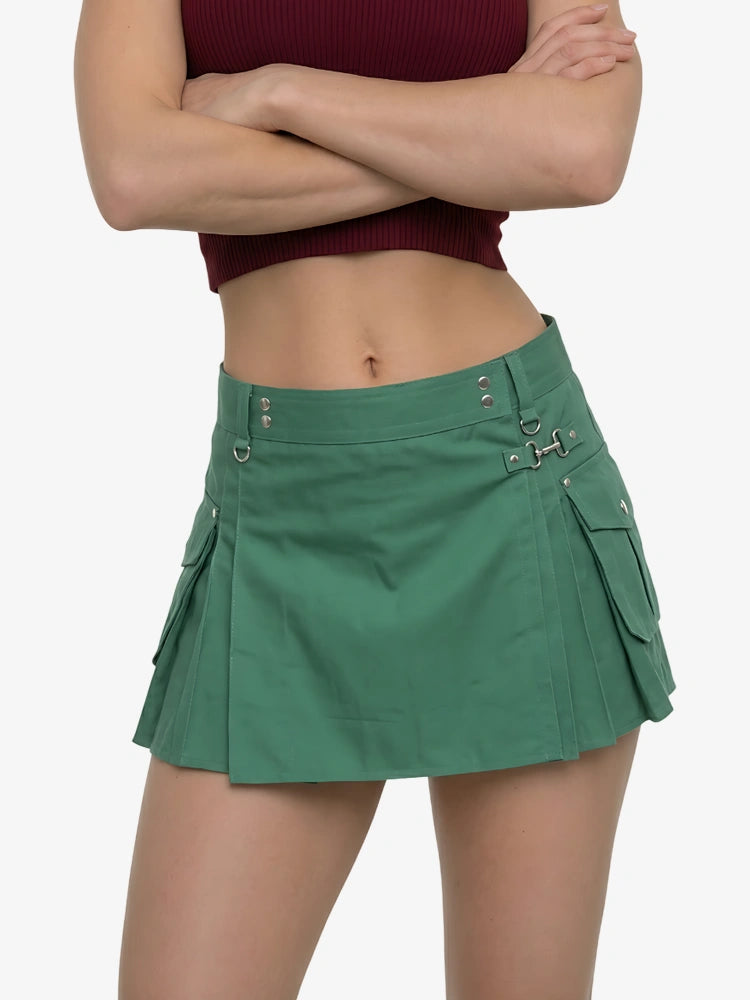 Green skirt worn by a person on a white background