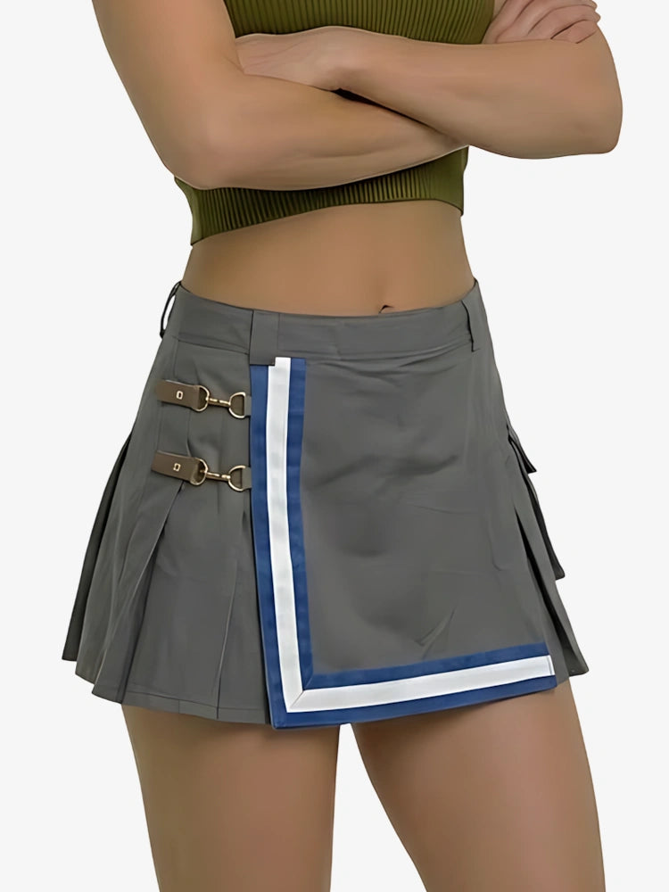 Gray pleated skirt with blue and white trim worn by a person on a white background