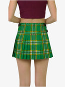Green plaid skirt worn by a person on a white background