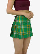 Green plaid skirt worn by a person on a white background