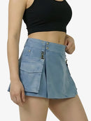 Blue denim skirt worn by a person on a white background