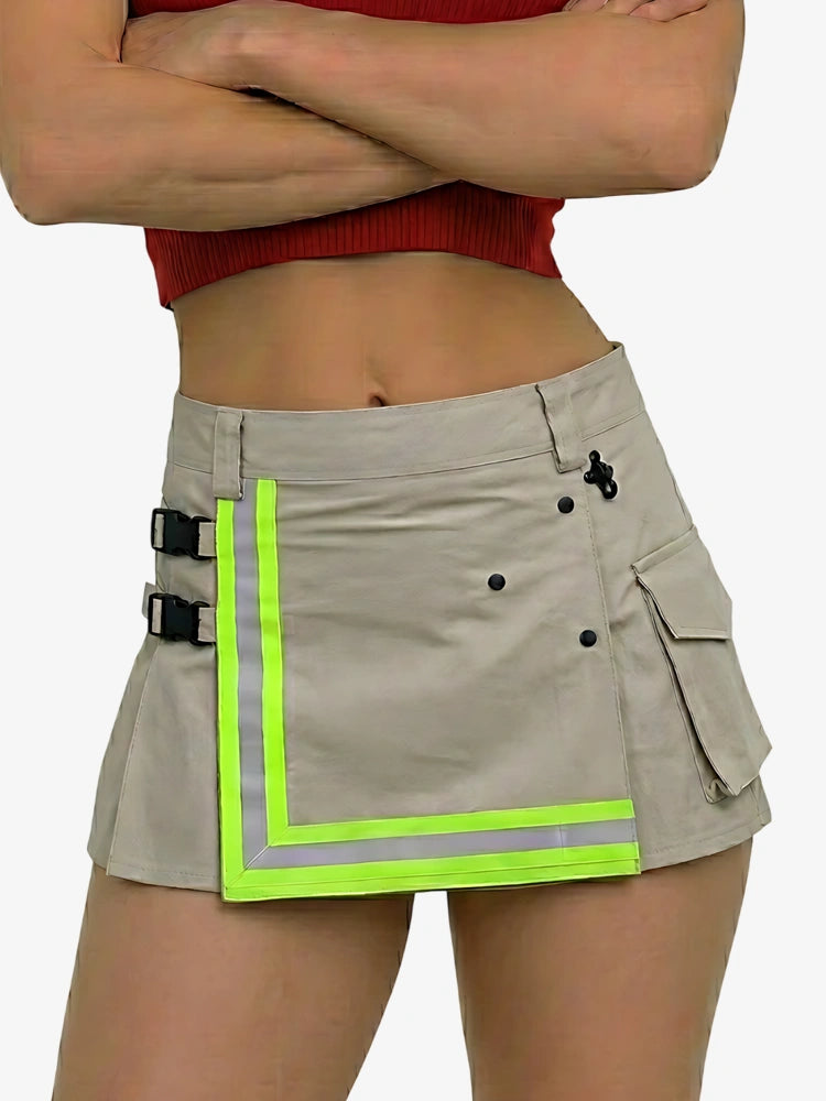 Person wearing a beige cargo skirt with reflective green trim on a white background