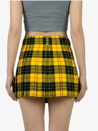 Yellow plaid skirt worn by a person on a white background