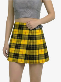 Person wearing a yellow plaid skirt on a white background