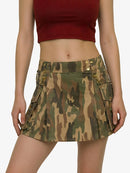 Camouflage skirt worn by a person on a white background