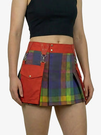 Person wearing a colorful plaid skirt with a red pocket on a white background