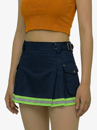 Navy blue skirt with reflective green strip worn by a person on a white background