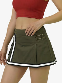 Green skirt with white stripes and metal buckles worn by a person on a plain background