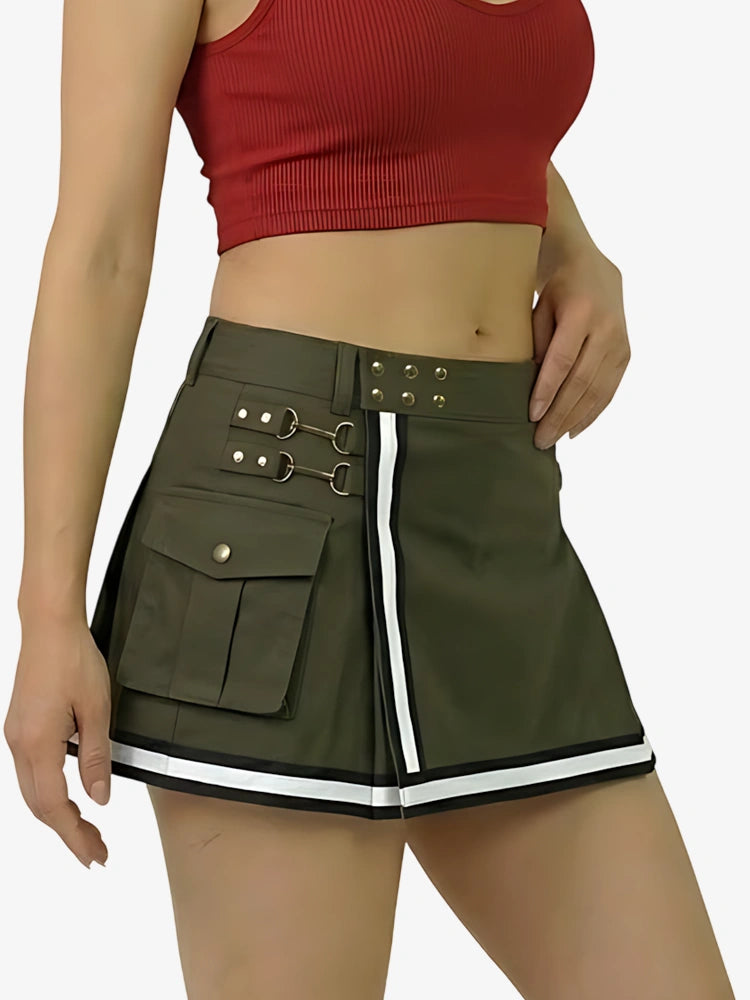 Person wearing a green skirt with white trim and a red top on a plain background