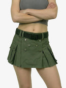 Person wearing a green skirt with a belt on a white background
