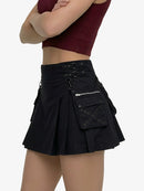 Black pleated skirt with decorative elements on a white background