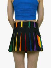 Mannequin wearing a blue crop top and rainbow-striped black skirt on a white background