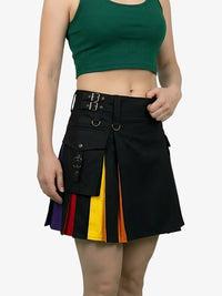 Person wearing a black kilt with colorful panels on a white background