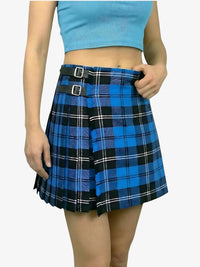 Blue plaid skirt worn by a person on a white background