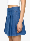 Blue pleated skirt worn by a person on a white background