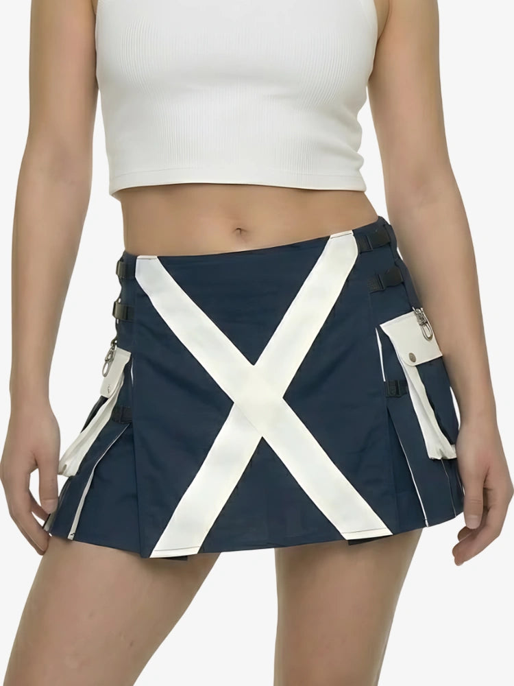 Navy blue skirt with white X design worn by a person on a white background