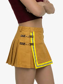 Person wearing a mustard yellow pleated skirt with reflective trim on a white background